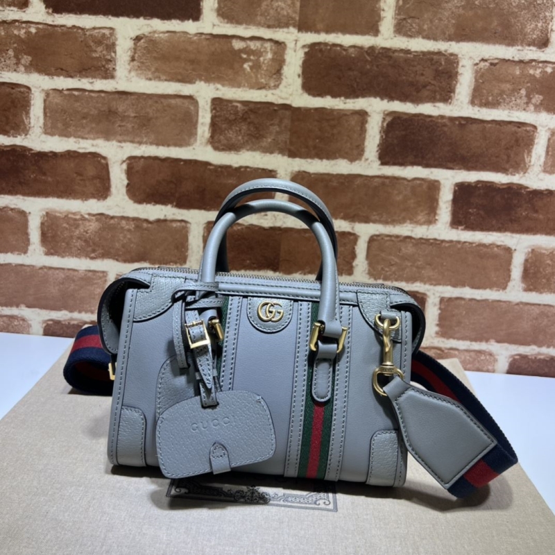 G*u*i top handle bags